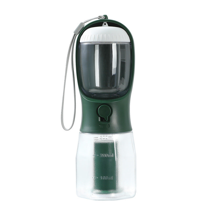 Green and clear portable pet water bottle with a strap on a white background